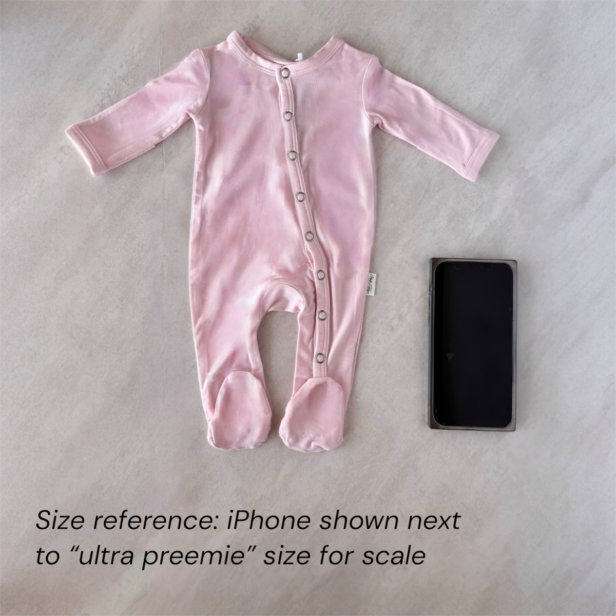 Cloud onesie sized for premature infant, preemie sized